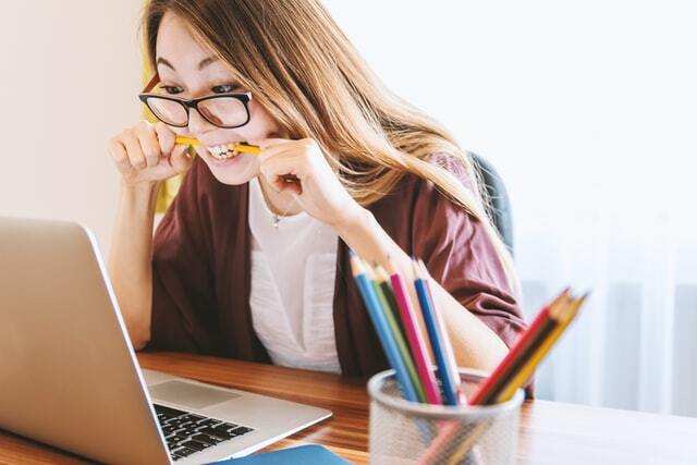 woman learning star method selection criteria on laptop